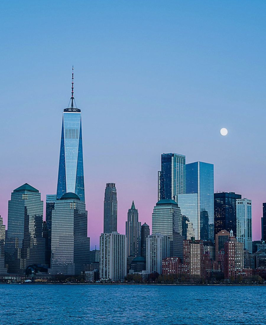 City skyline at dusk, flash wallet setup